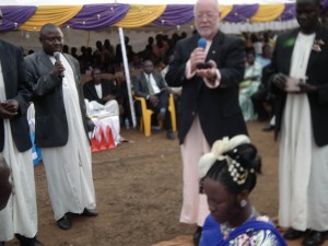 Ron blessing rings at an Introduction Ceremony